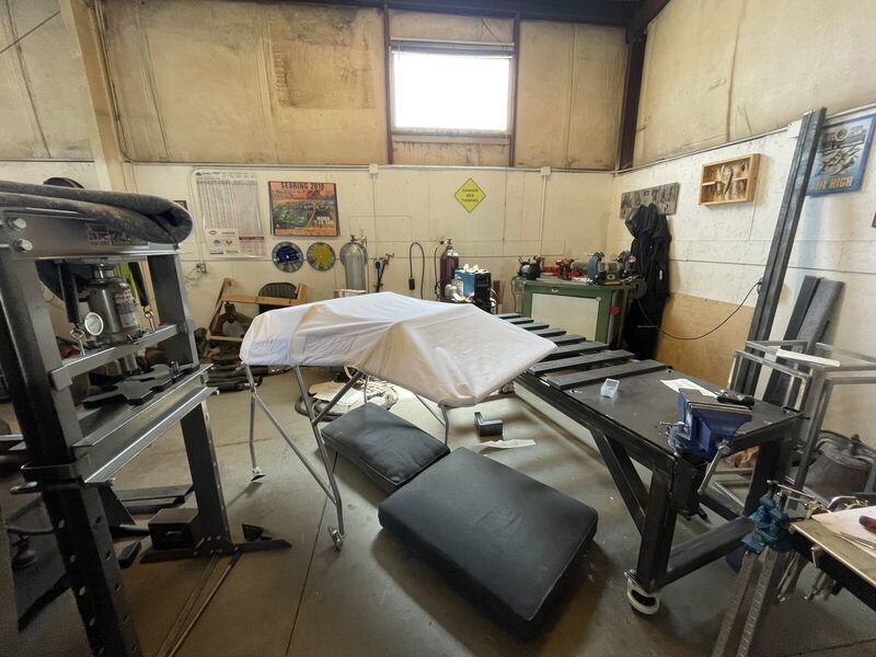 The frame with its canvas top, in the shop